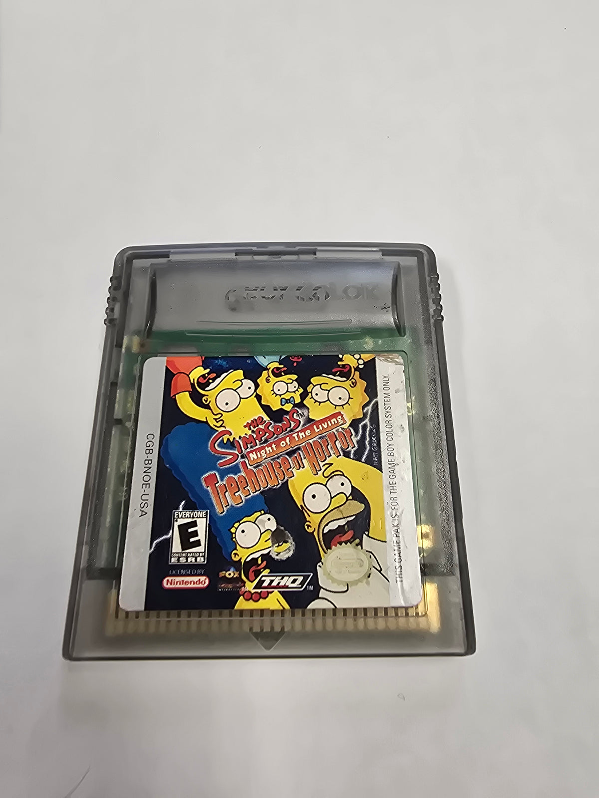 The Simpsons Night Of The Living Treehouse Of Horrors GBC game cartridge, vintage horror-themed adventure, collectible item
